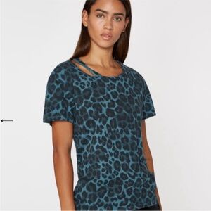 Price Firm. Pam & Gela Two Toned Blue Leopard Print Cut Out Top, Size P/XS.